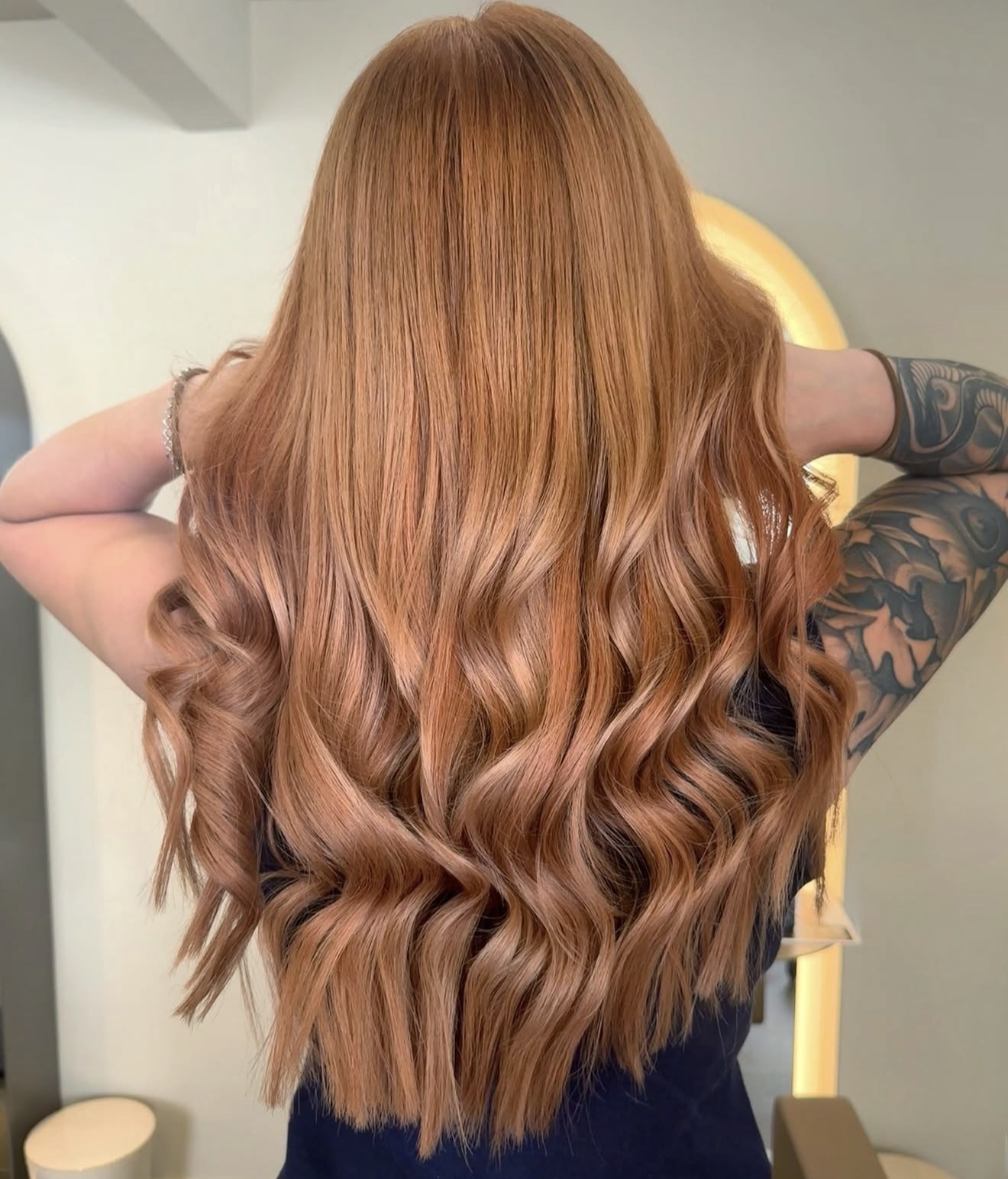 Strawberry Blonde Waves With Face-Framing Layers