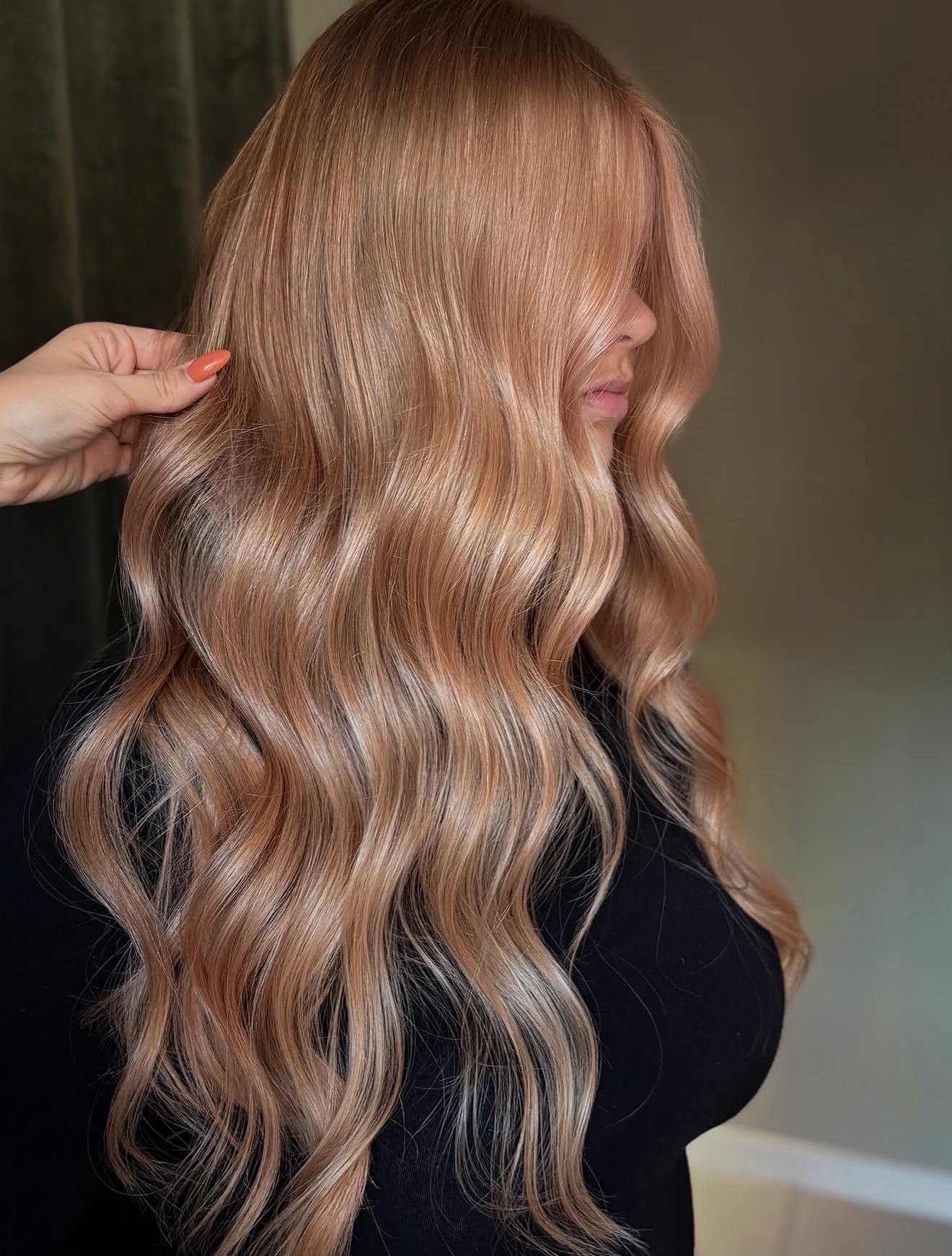 Strawberry Blonde Waves With Face-Framing Layers