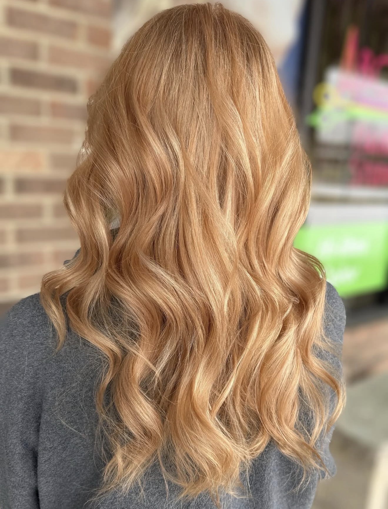 Strawberry Blonde Waves With Golden Undertones