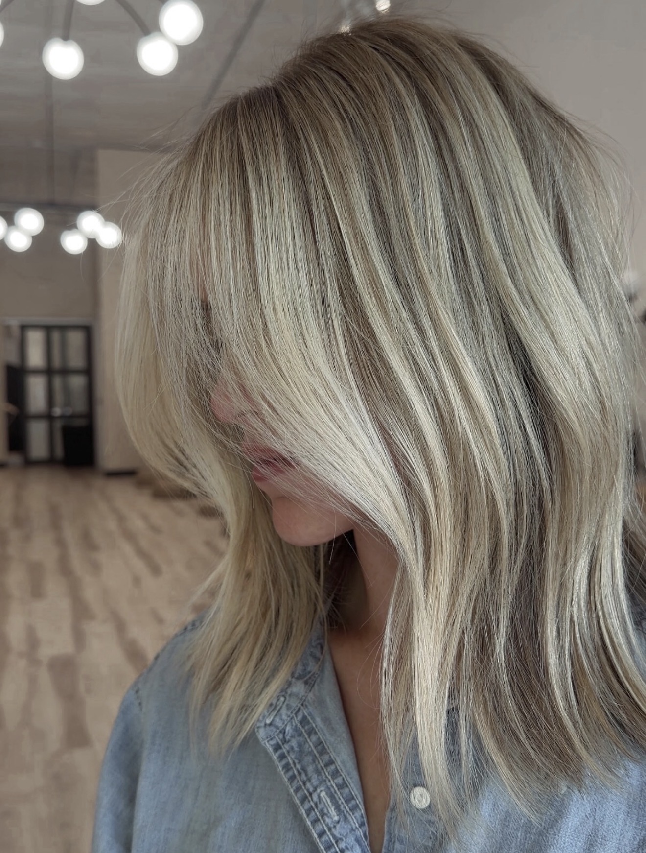 Sun-Kissed Ash Blonde Balayage With Face-Framing Layers