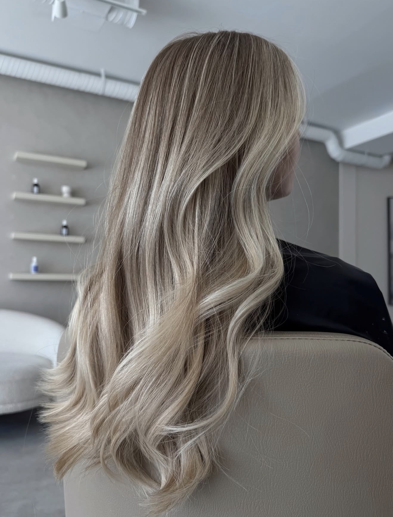Sun-Kissed Ash Blonde Balayage With Soft Waves