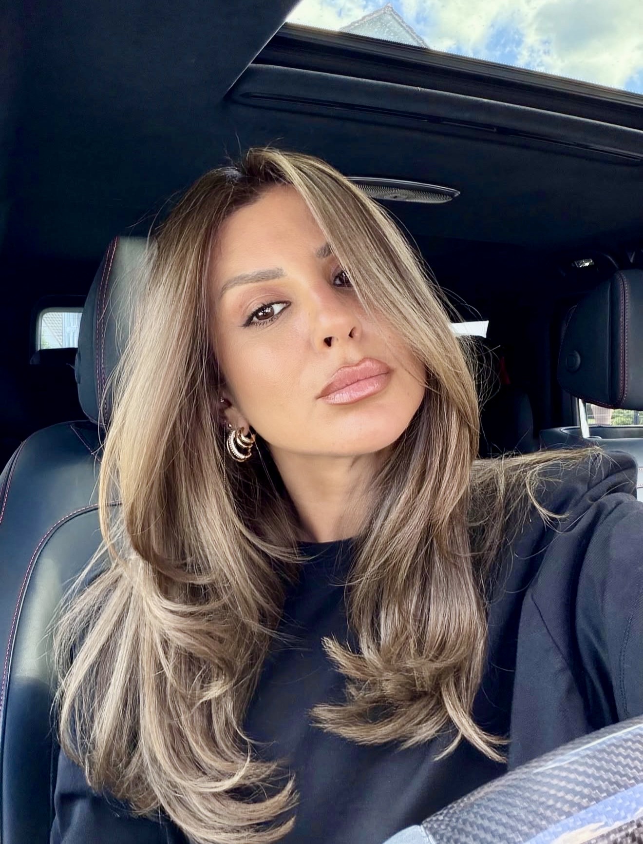 Sun-Kissed Ash Blonde Balayage With Voluminous Waves