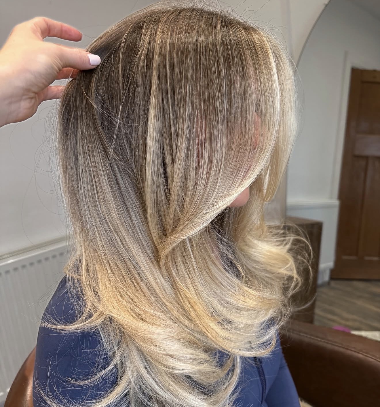 Sun-Kissed Blonde Balayage With Face-Framing Layers