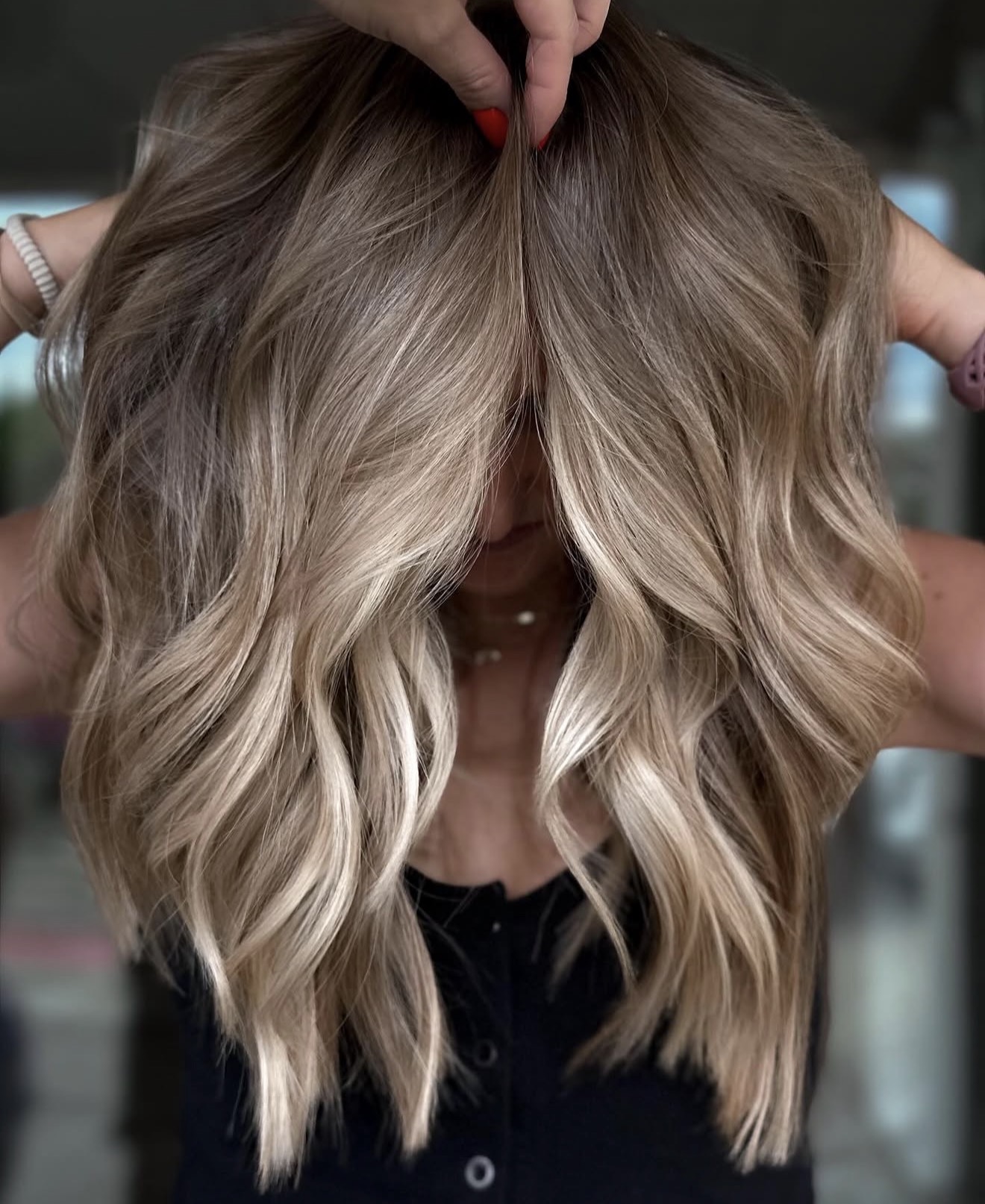 Sun-Kissed Blonde Balayage With Loose Waves