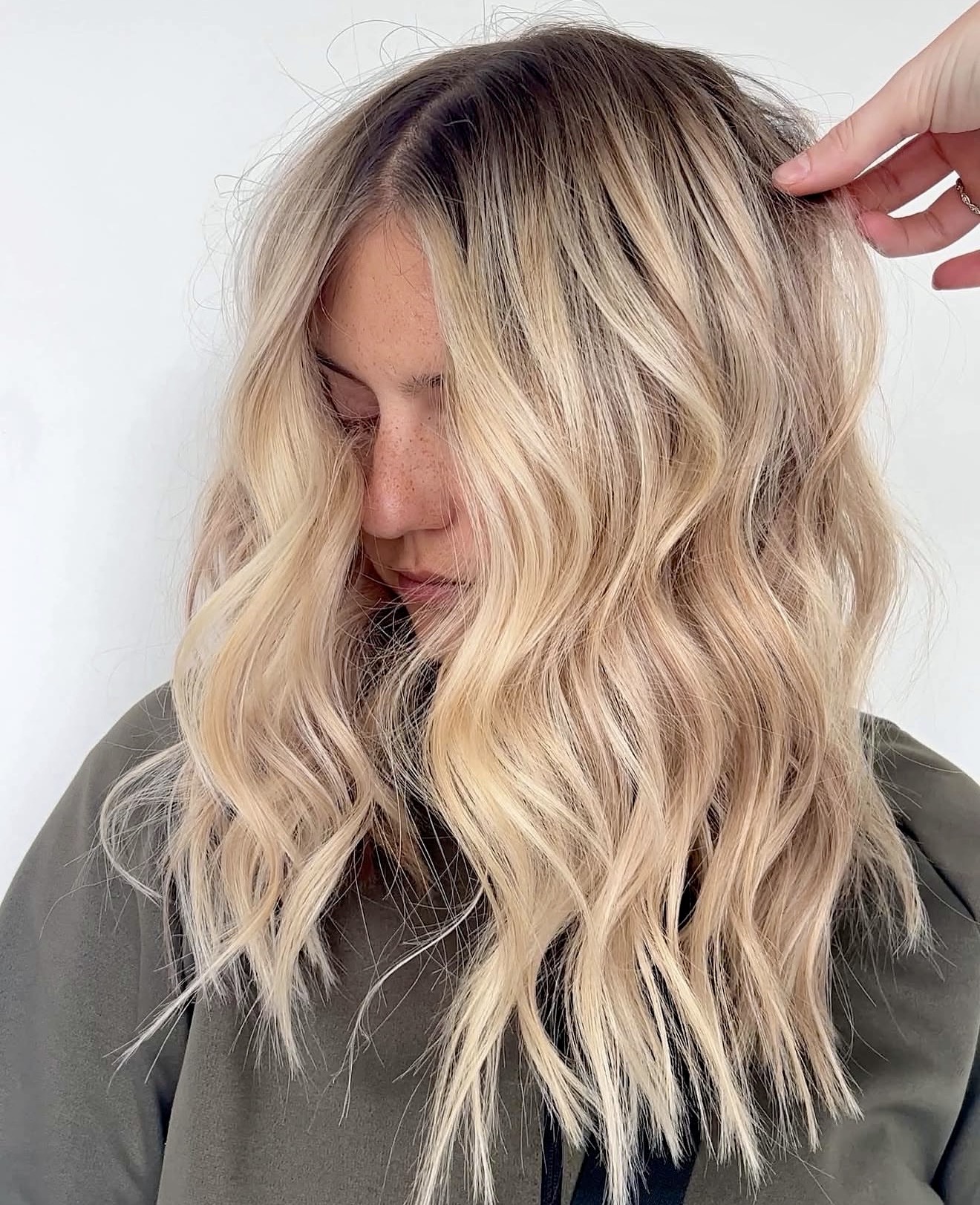Sun-Kissed Blonde Waves With Dark Root