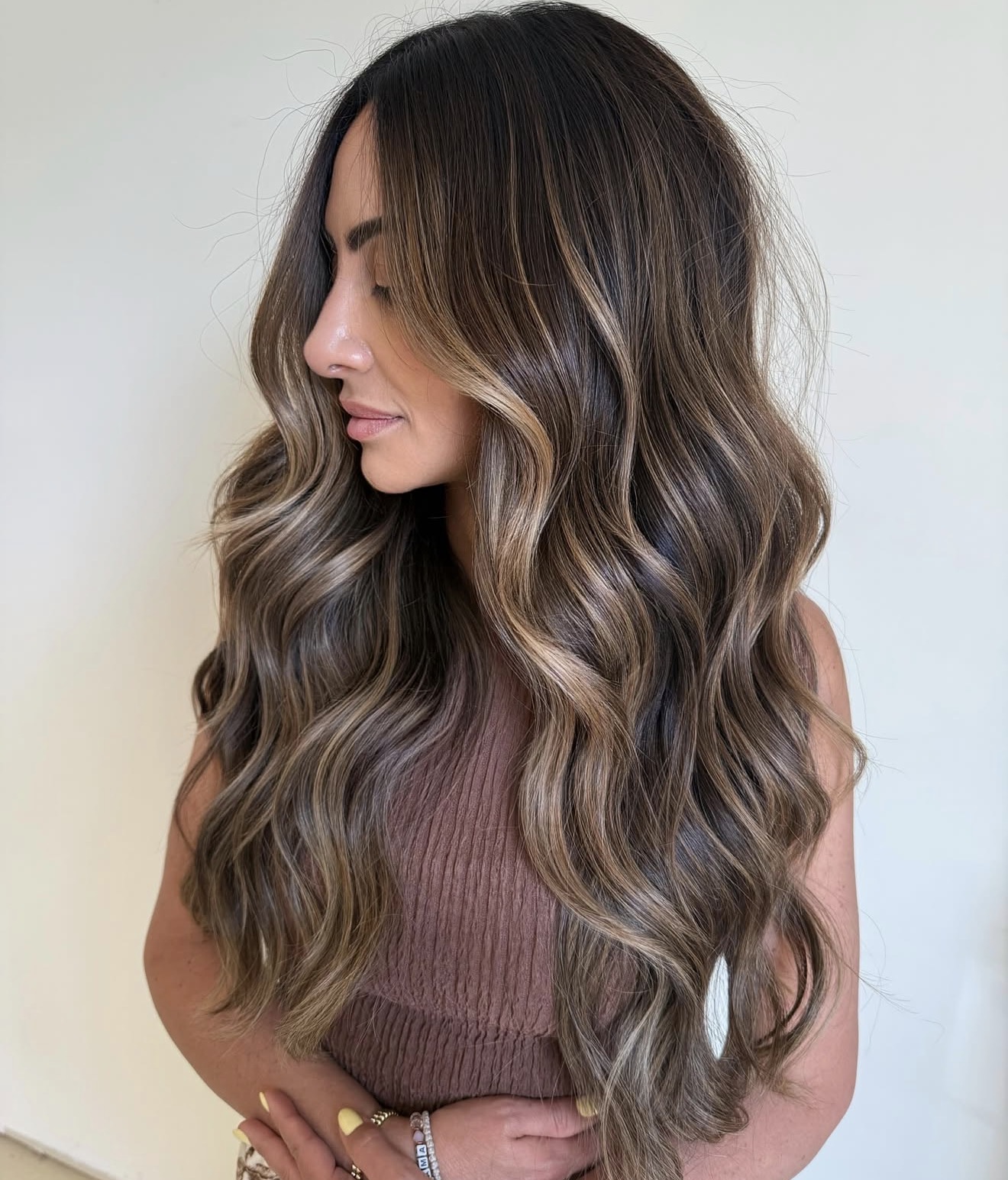 Sun-Kissed Brunette Waves With Honey Blonde Balayage