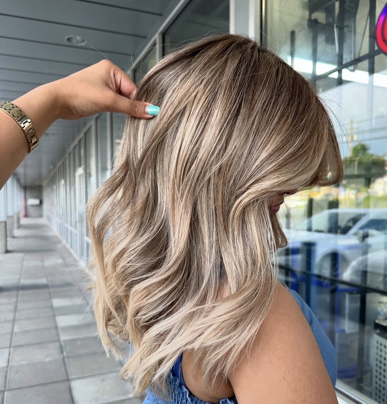 Sun-Kissed Dirty Blonde Beach Waves With Face Framing