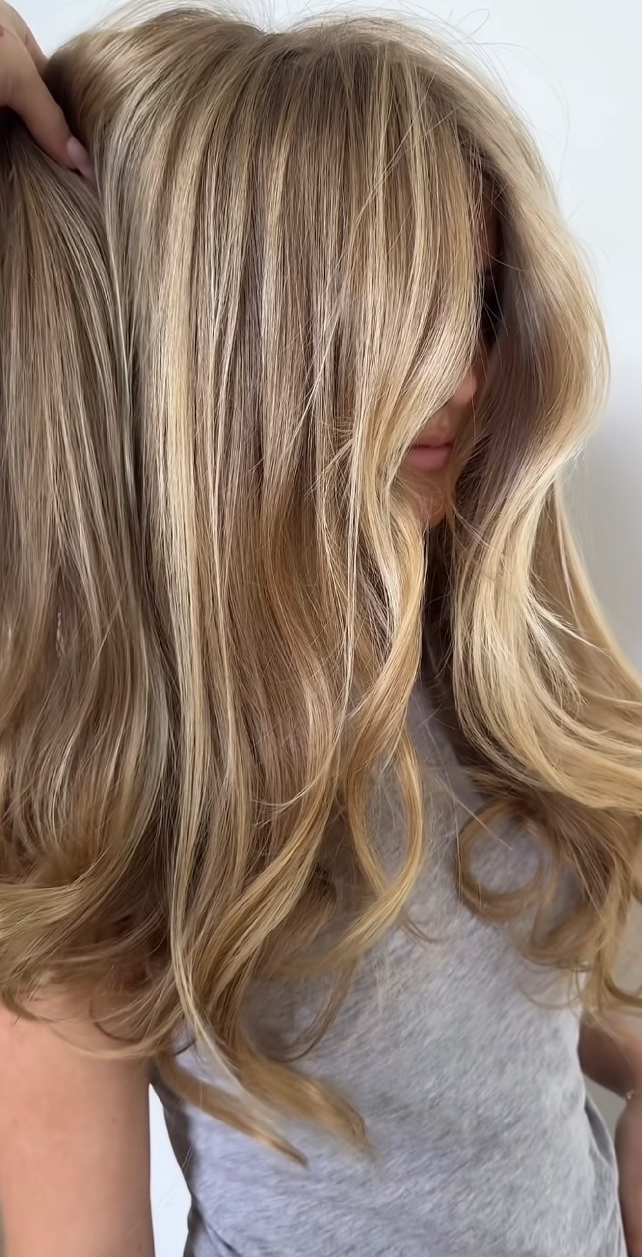 Sun-Kissed Dirty Blonde Waves With Face-Framing Layers
