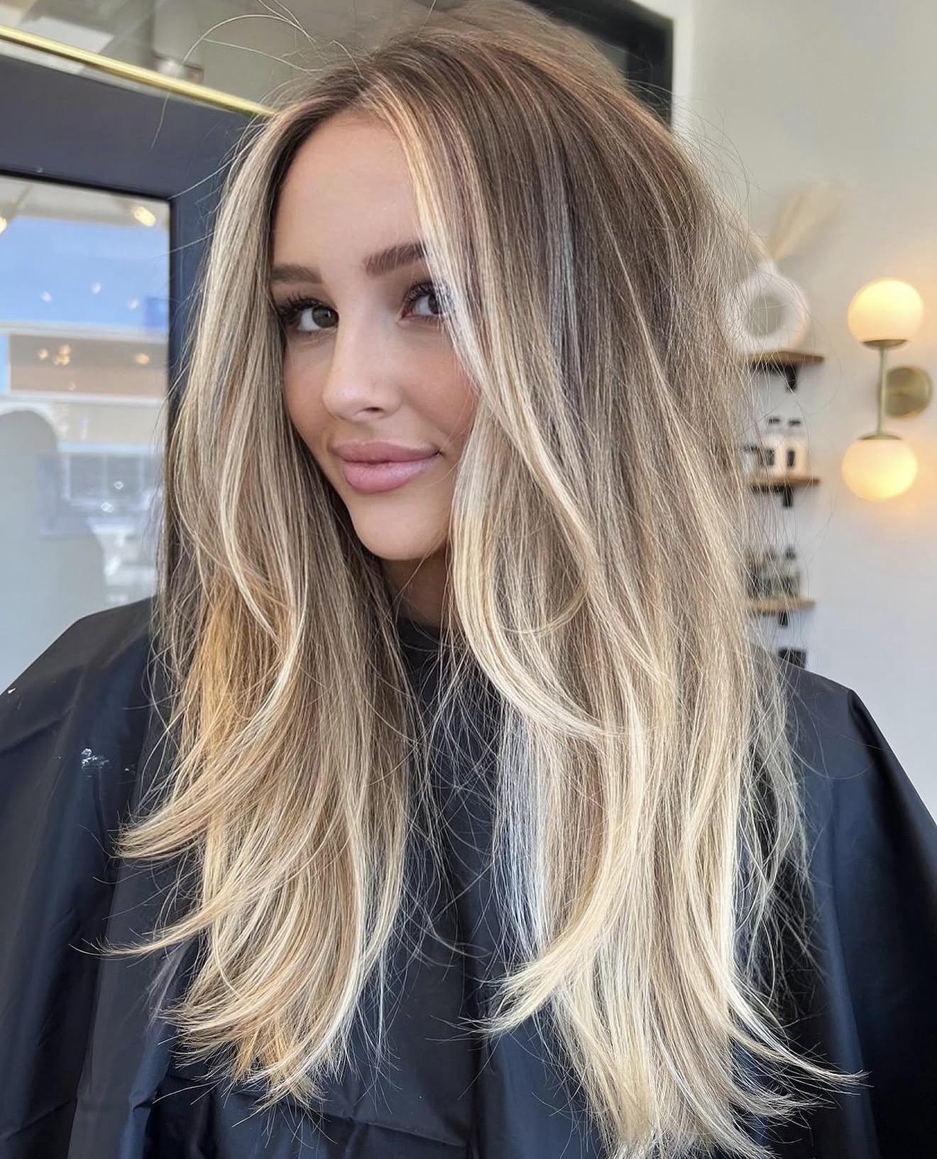 Sun-Kissed Honey Blonde Balayage With Face Framing Layers