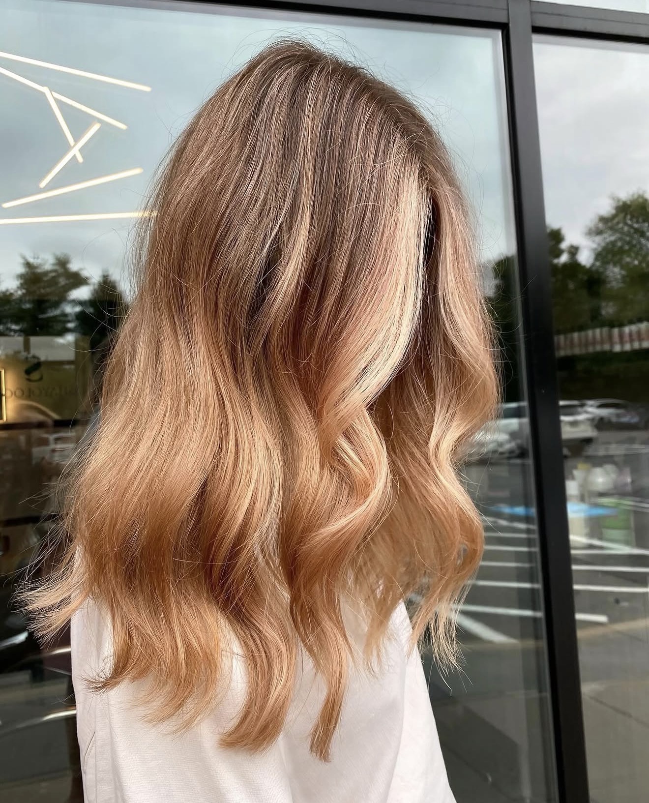 Sun-Kissed Strawberry Blonde Waves With Soft Blends