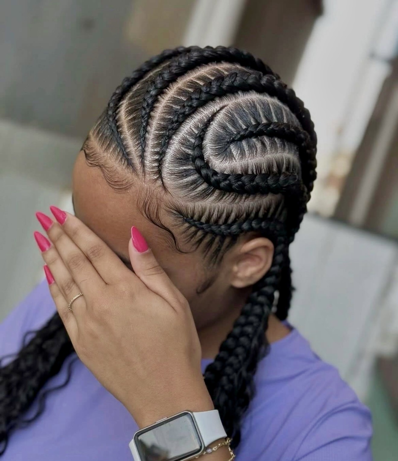 Swirl Cornrow Braids With Woven Extensions
