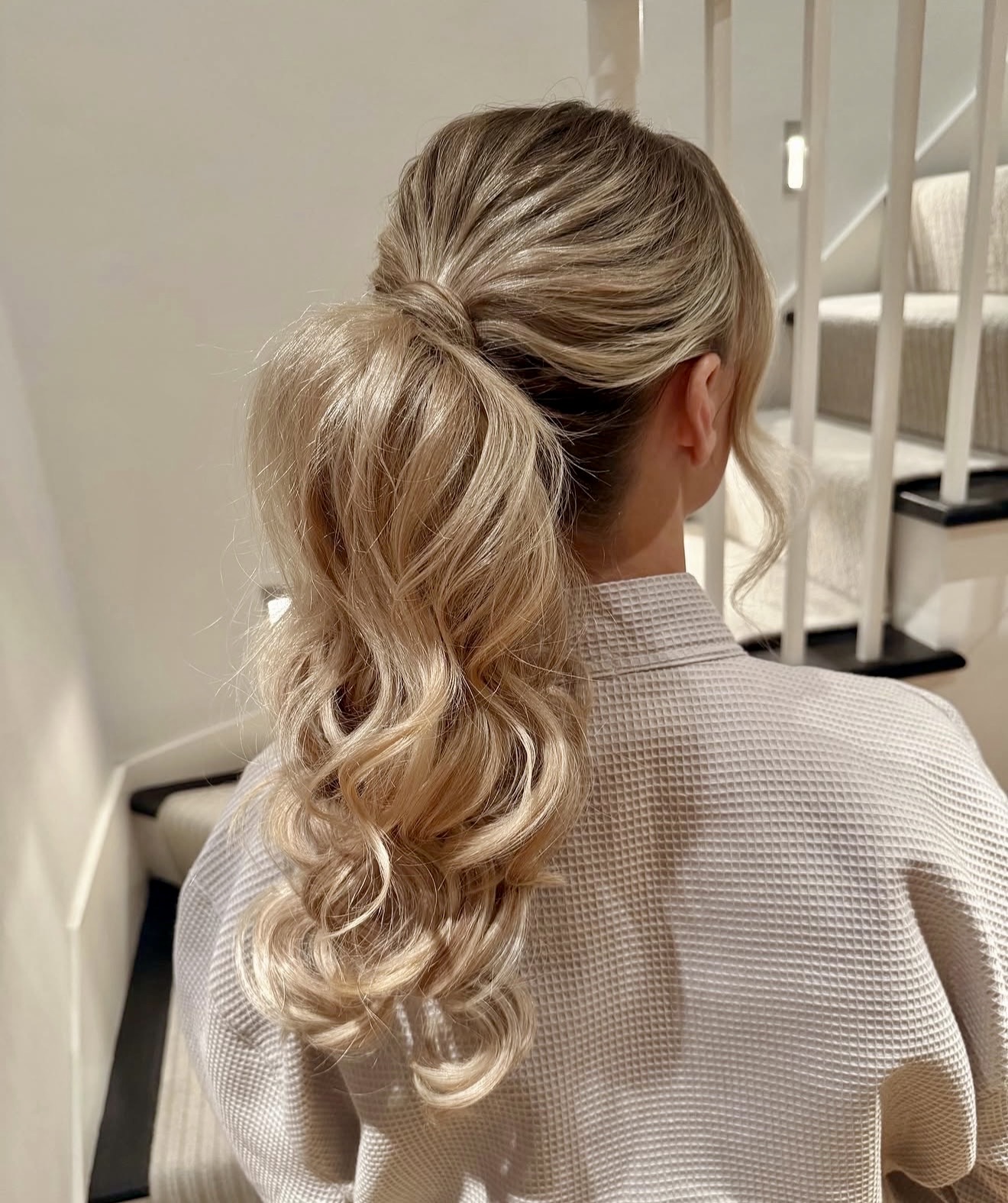 Textured High Ponytail With Loose Waves