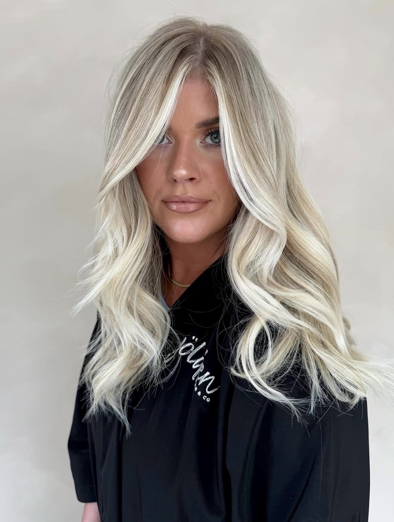 Tousled Blonde Balayage With Face-Framing Layers
