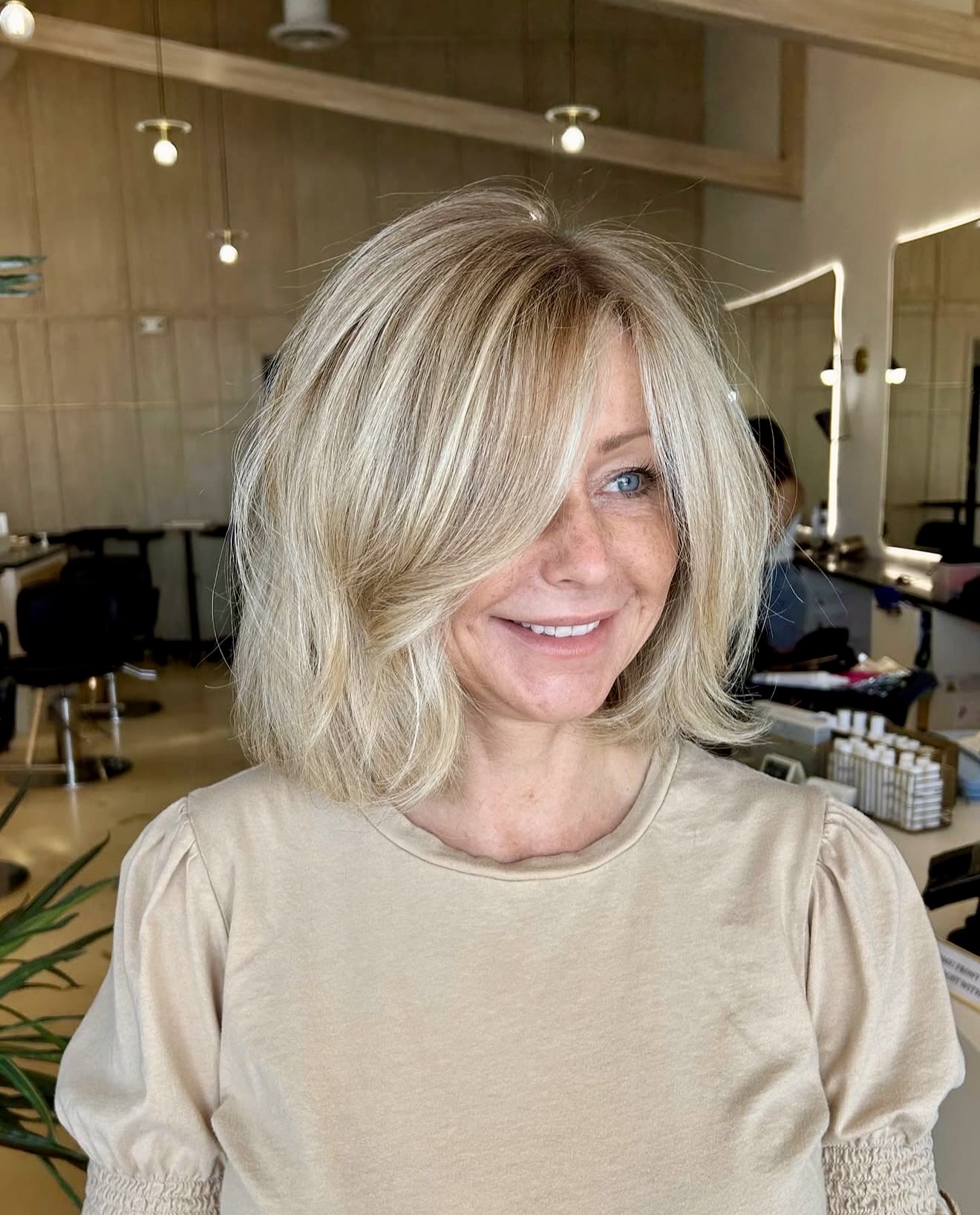 Tousled Blonde Bob With Wispy Curtain Bangs