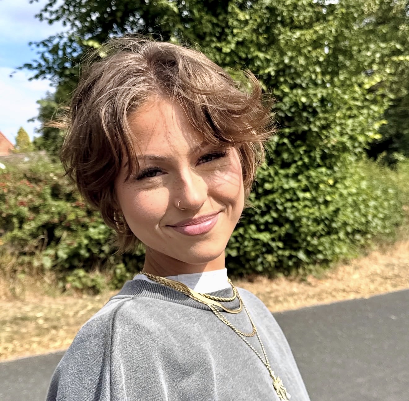 Tousled Bronde Pixie With Face Framing Layers
