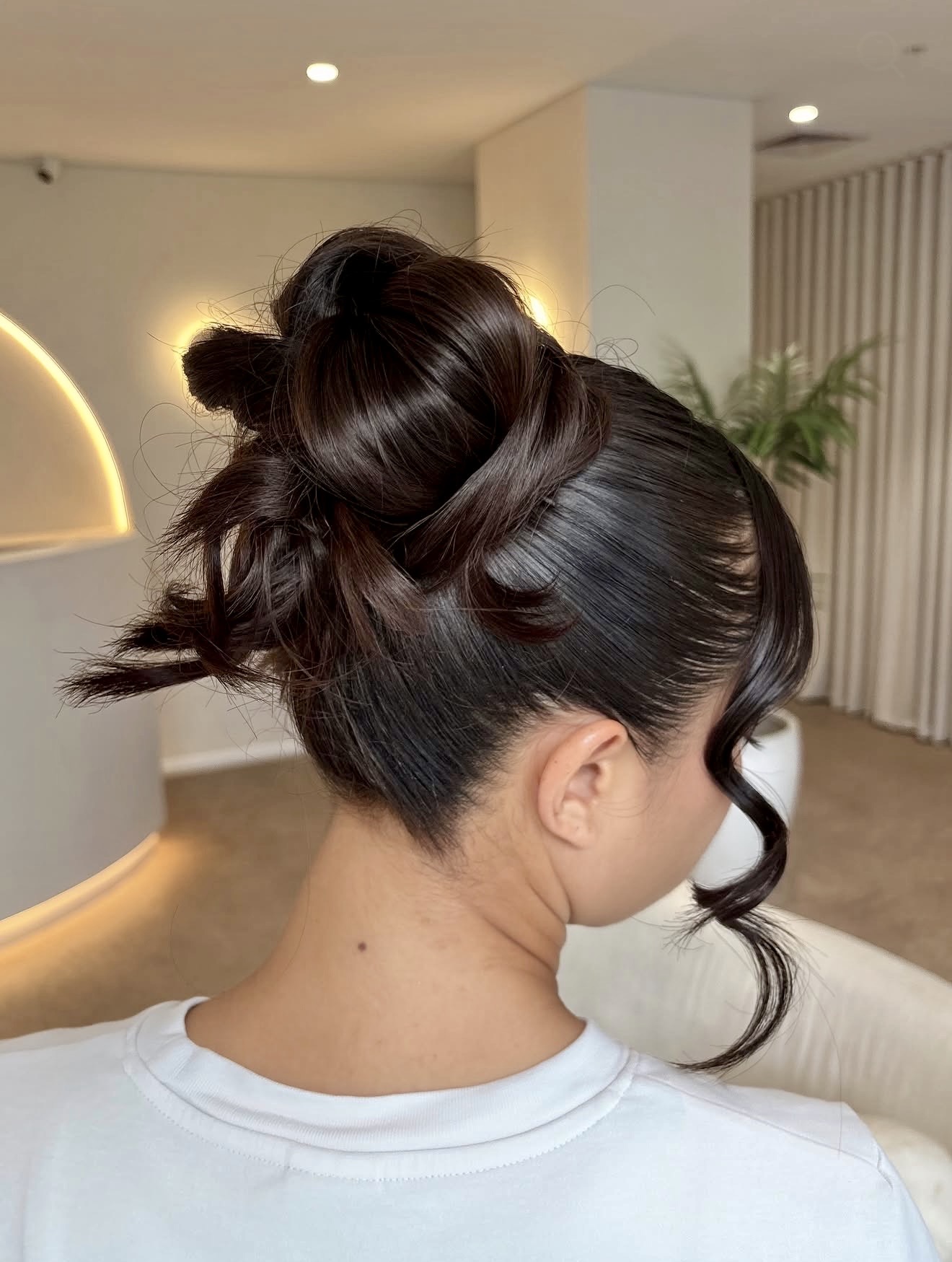 Tousled Chignon With Wispy Face-Framing Tendrils
