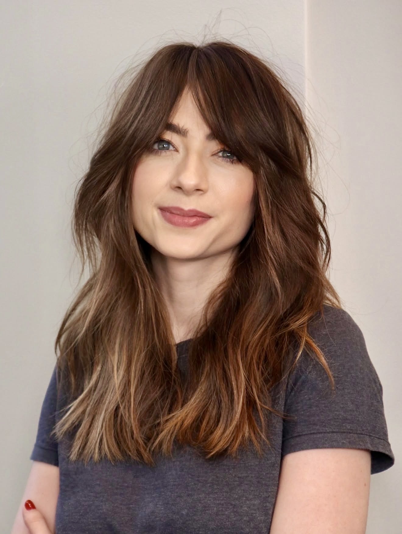 Tousled Curtain Bangs With Bronde Balayage Waves