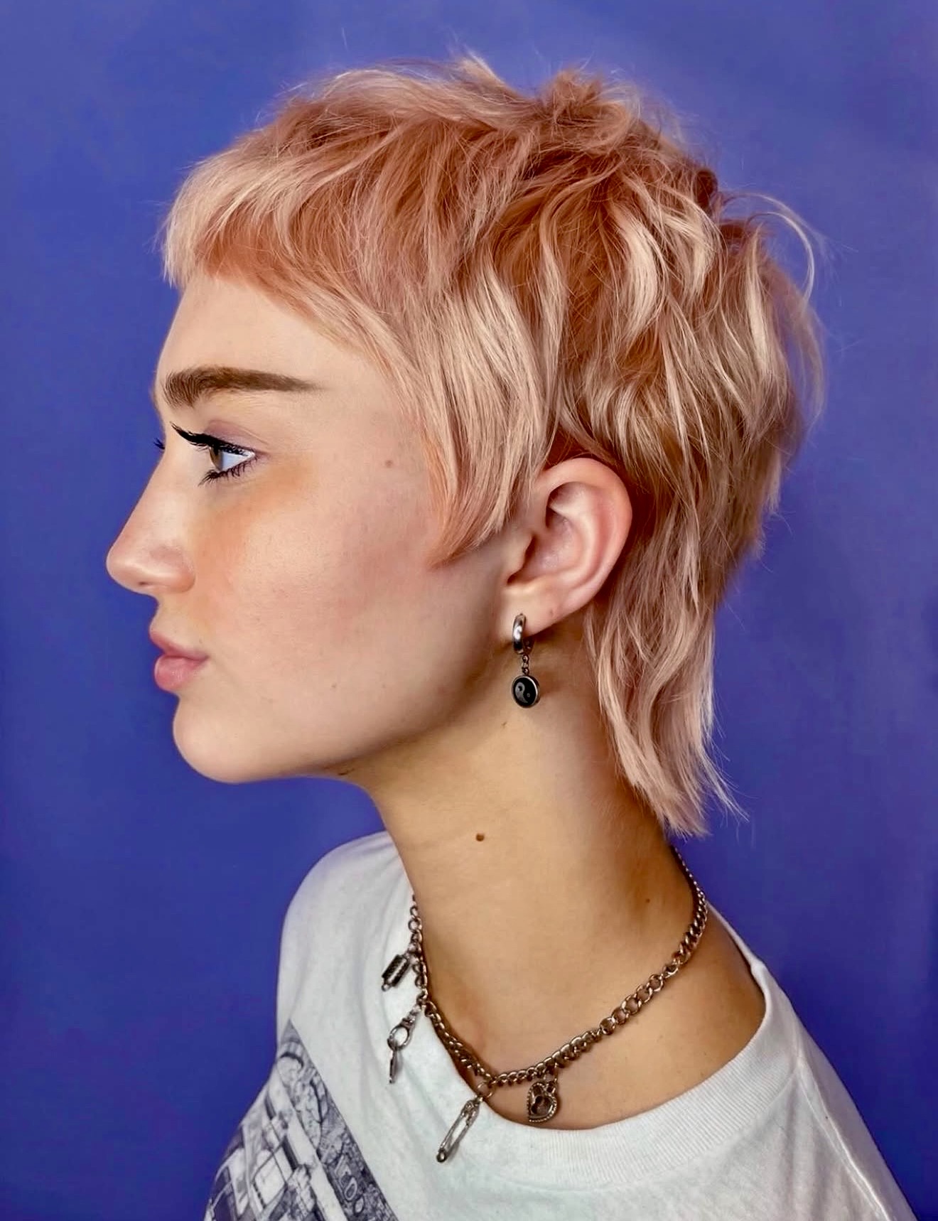Tousled Rose Gold Pixie With Textured Layers