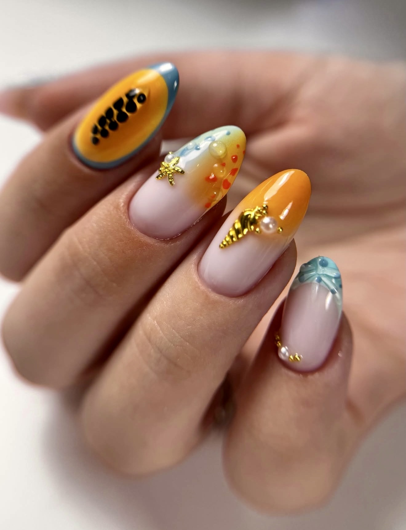 Tropical Fruit and Seashell Almond Nails