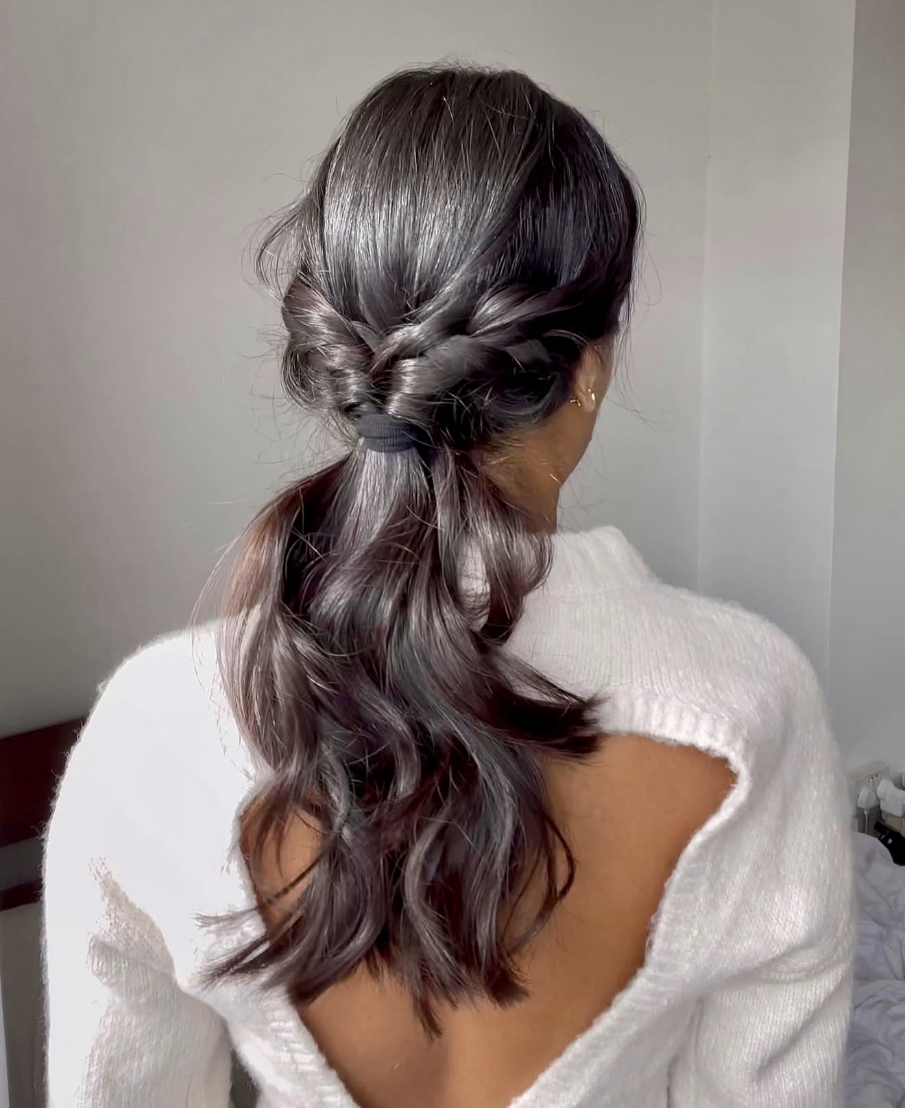 Twisted Waterfall Ponytail With Loose Waves