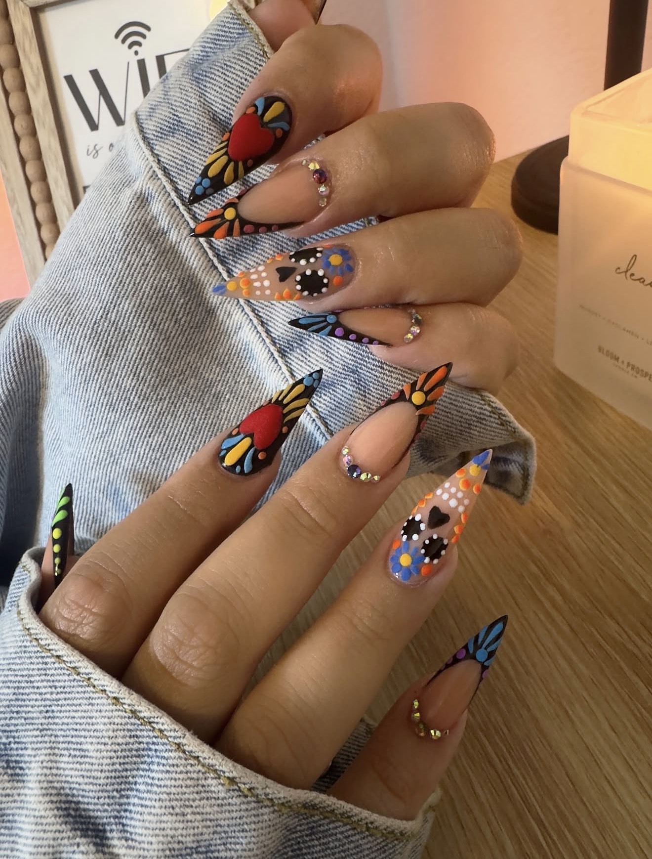 Vibrant Butterfly & Floral French Tip Almond Nails
