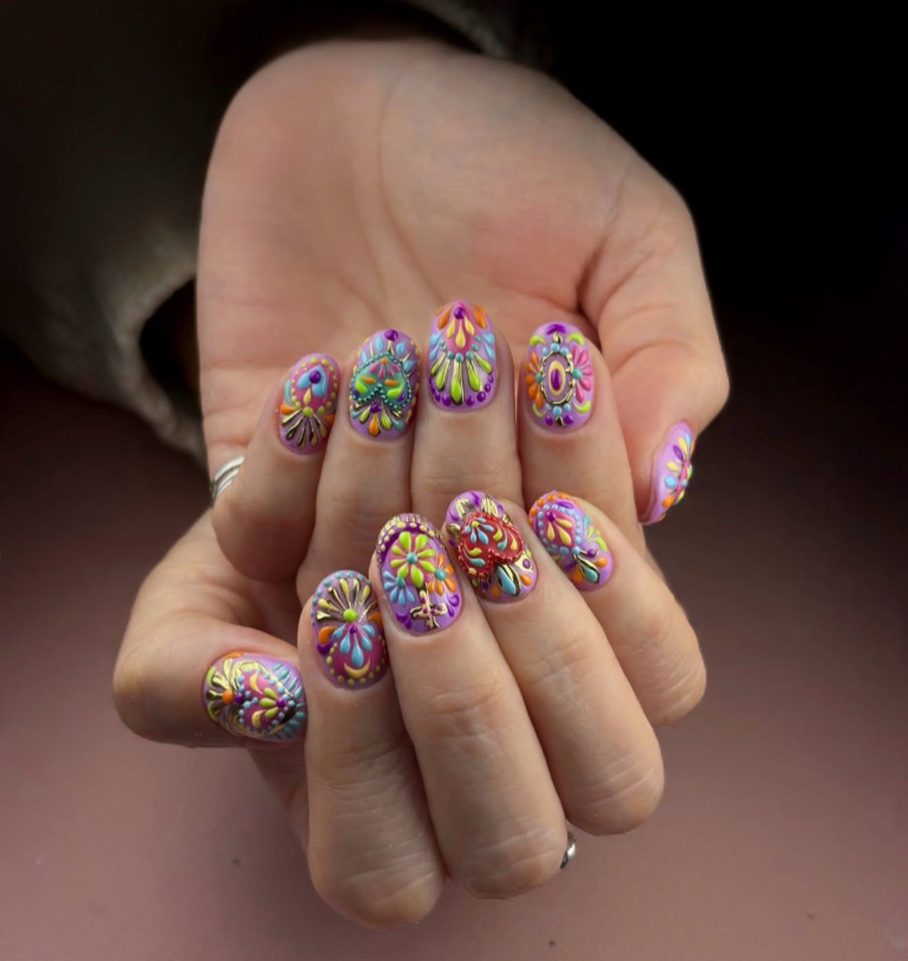 Vibrant Ethnic Floral Embossed Oval Nails