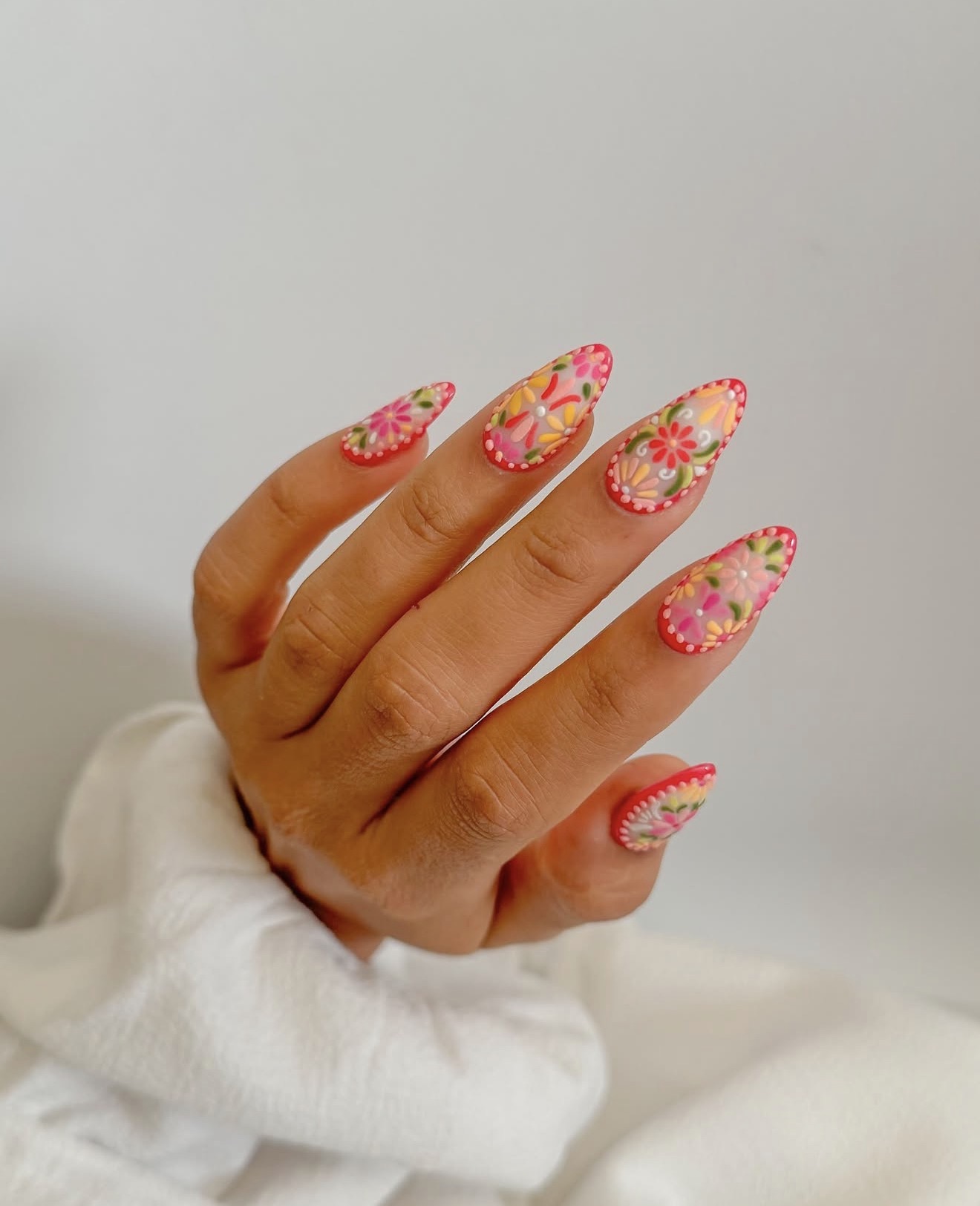 Vibrant Folk Floral Almond Nails