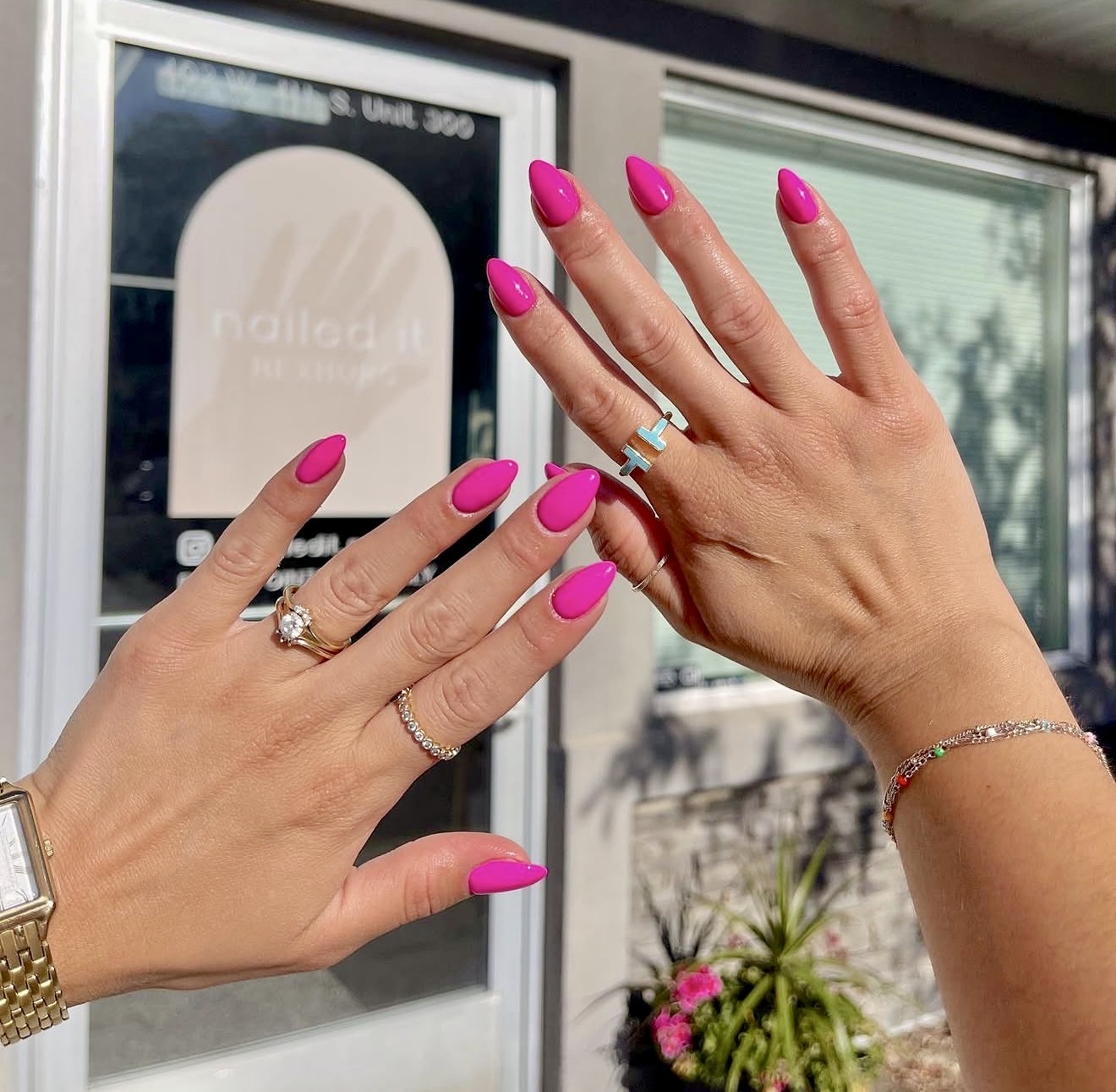 Vibrant Hot Pink Glossy Almond Nails