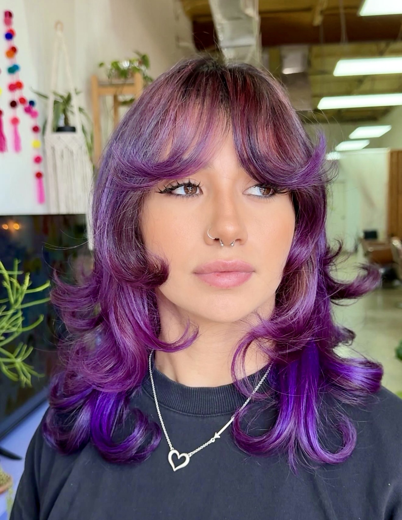 Vibrant Purple Wolf Cut With Face Framing Bangs