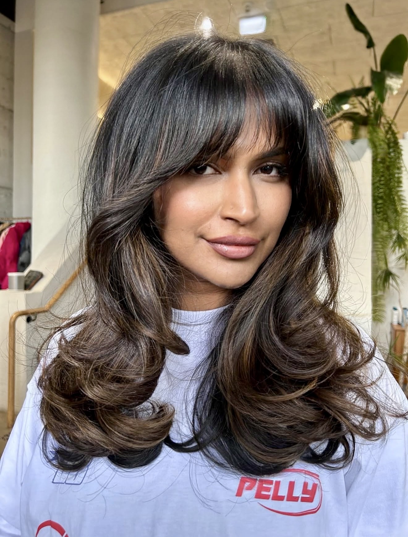 Voluminous Curtain Bangs With Soft Waves