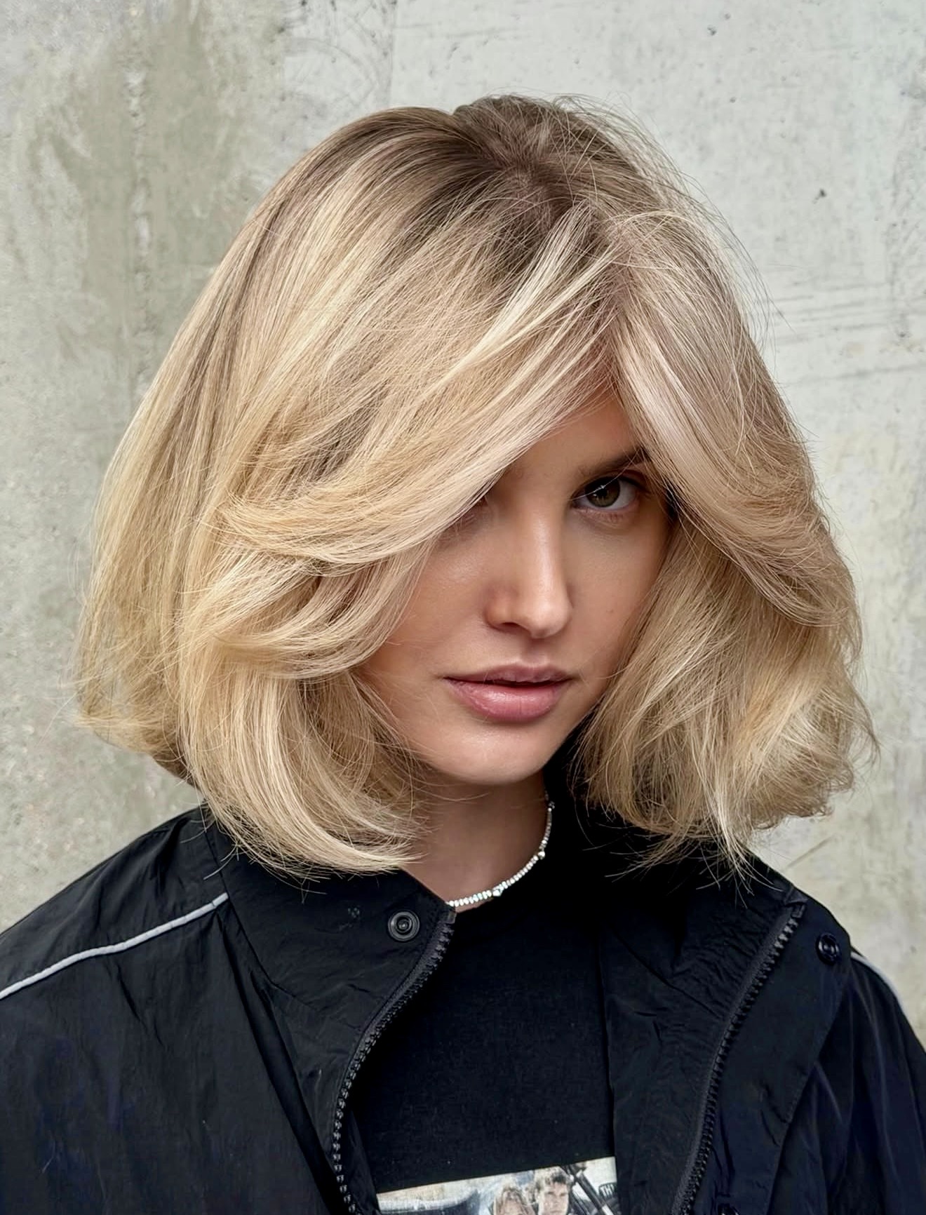 Voluminous Honey Blonde Layered Bob With Face Framing