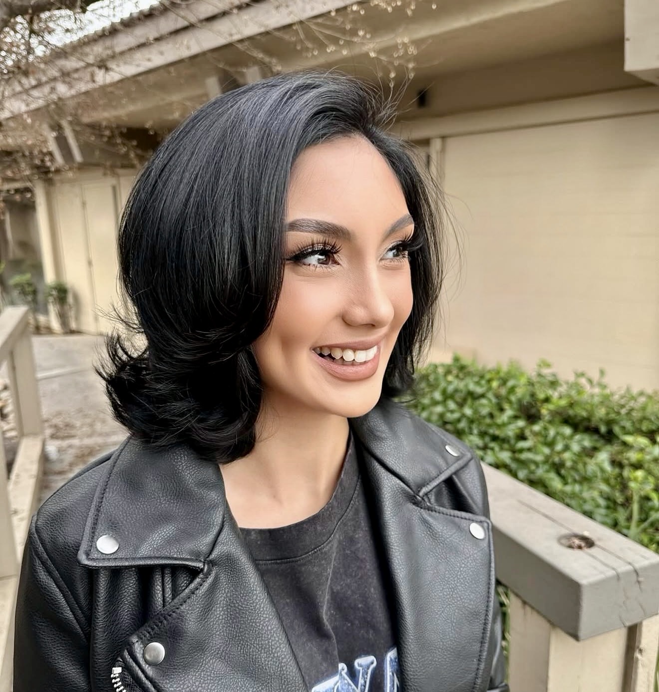 Voluminous Layered Black Bob with Face-Framing