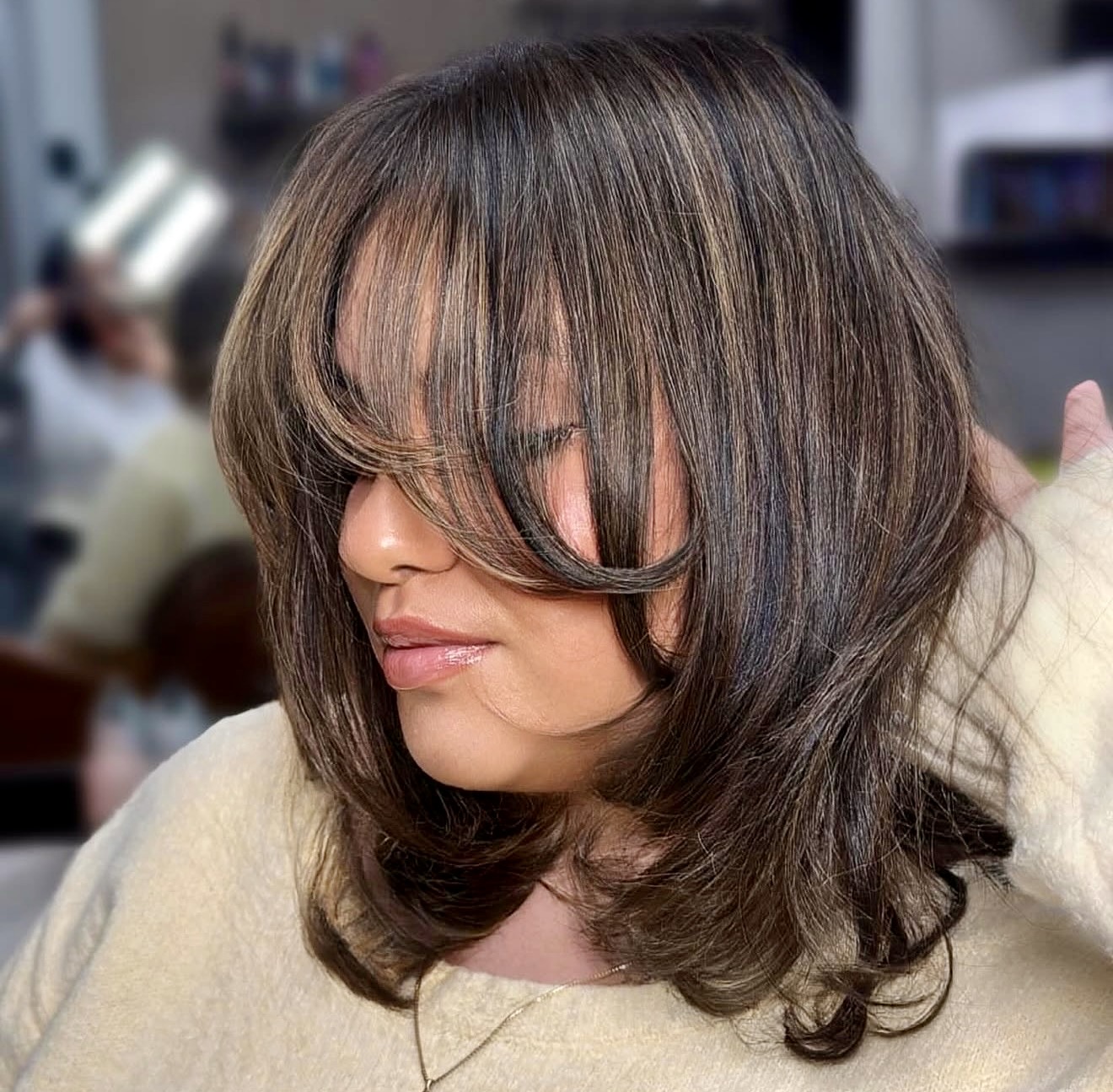 Voluminous Layered Bob With Face-Framing Curtain Bangs
