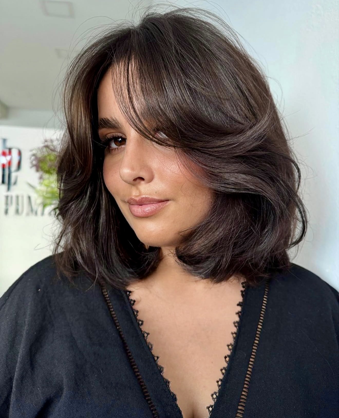 Voluminous Layered Brunette Bob With Face-Framing Bangs