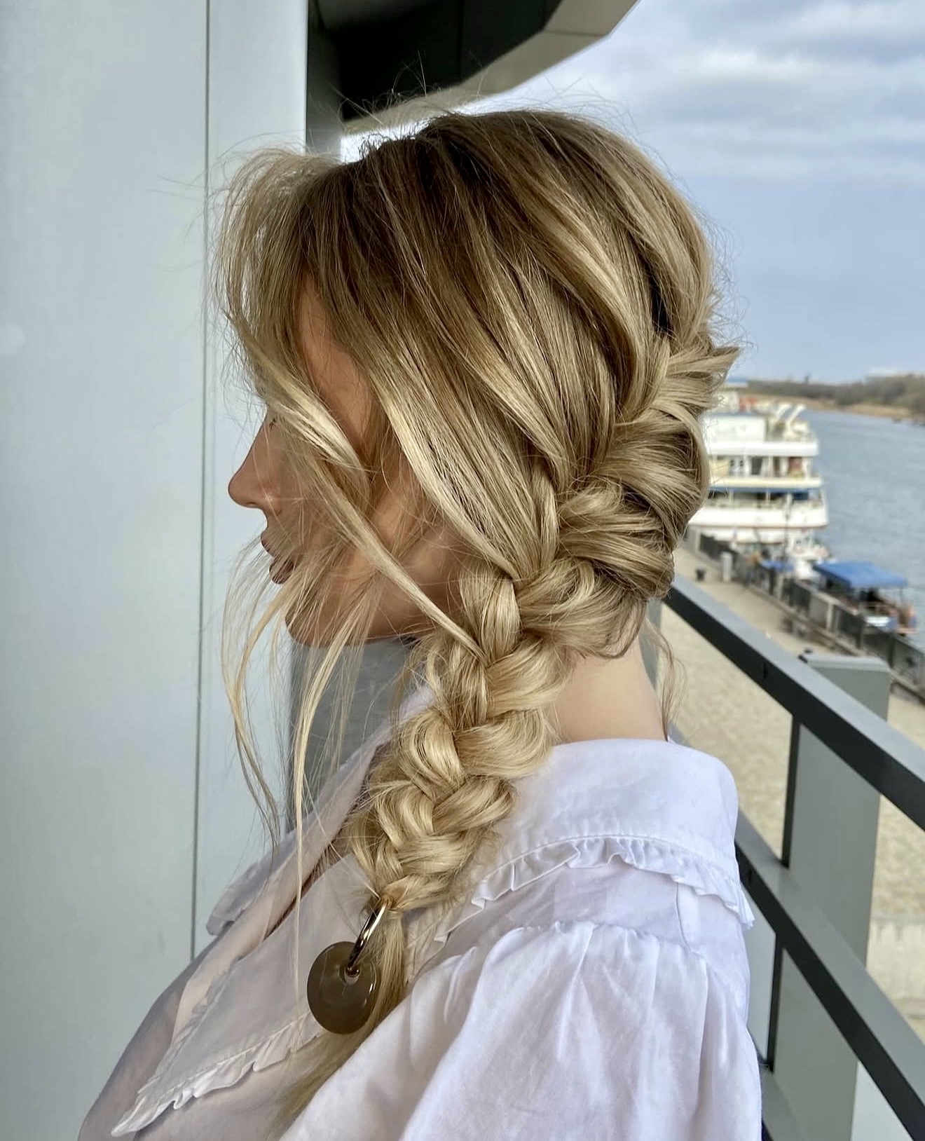 Voluminous Waterfall Braid With Wispy Face-Framing Strands