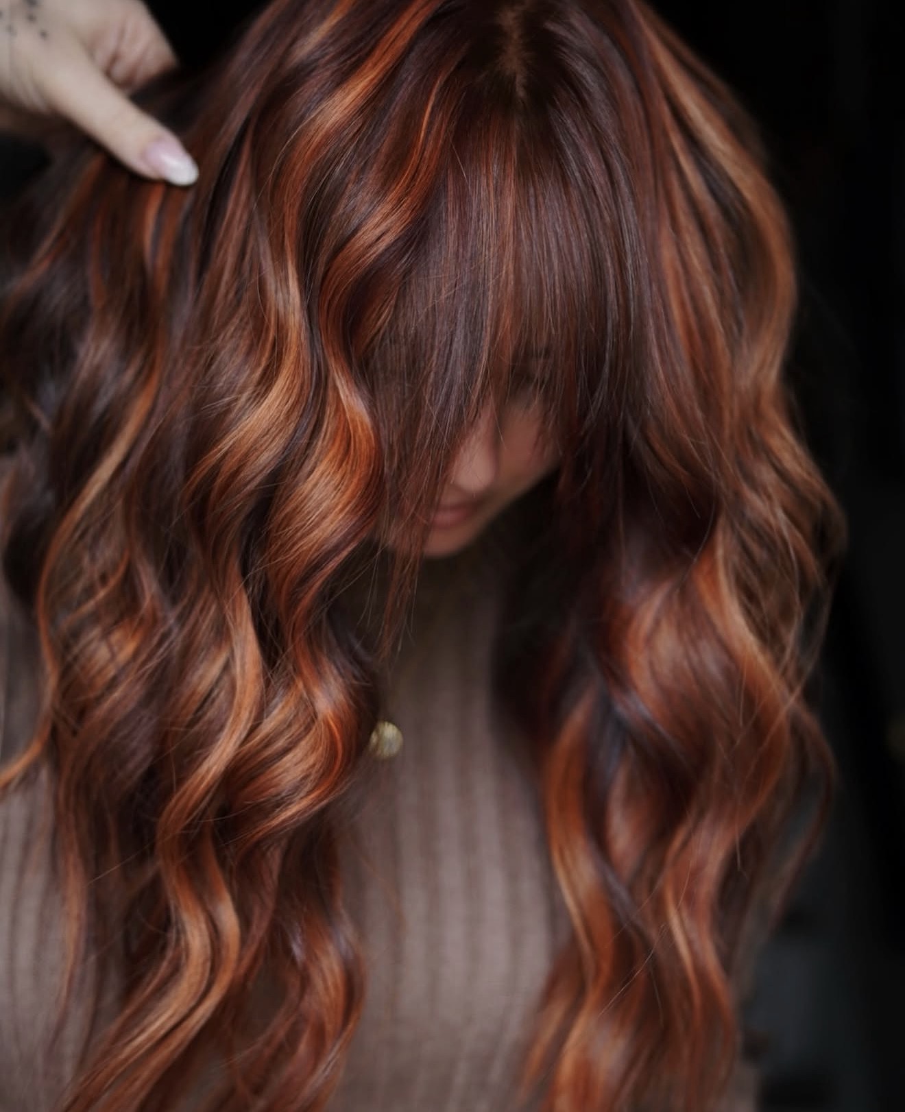 Warm Auburn Balayage With Lived-In Waves