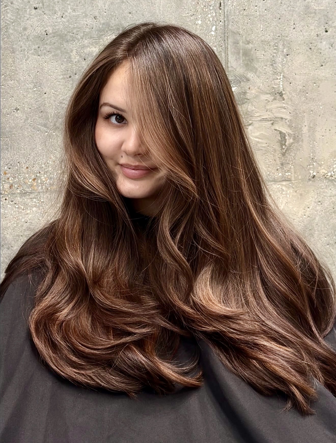 Warm Bronze Balayage With Face-Framing Layers