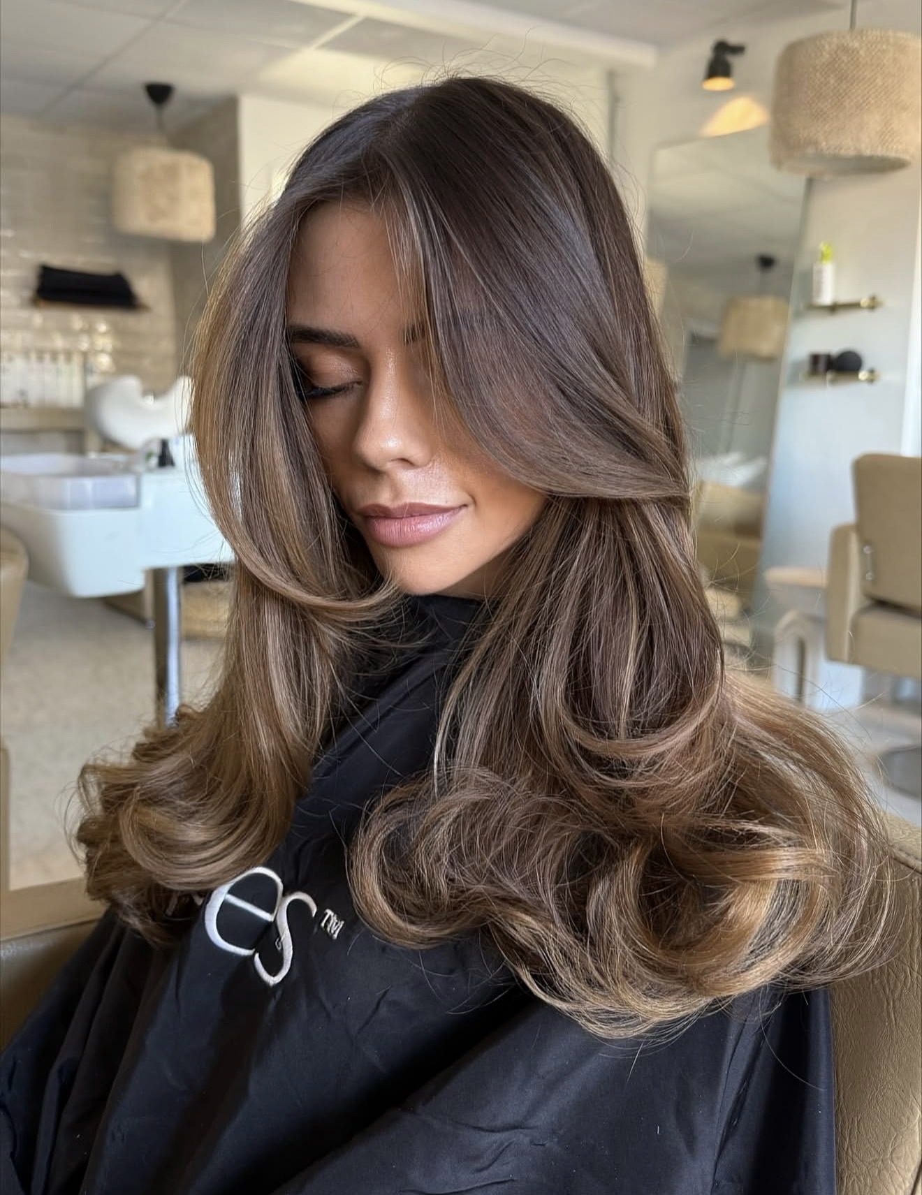 Warm Chestnut Balayage With Face-Framing Layers