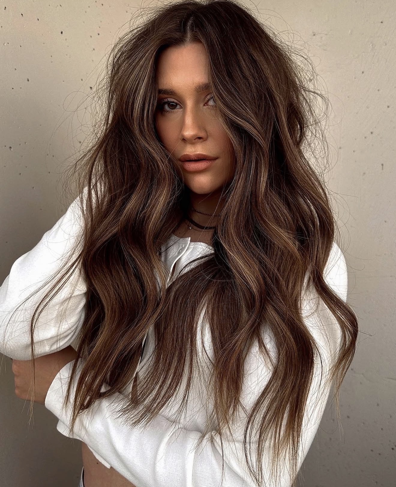 Warm Chestnut Balayage With Loose Beach Waves