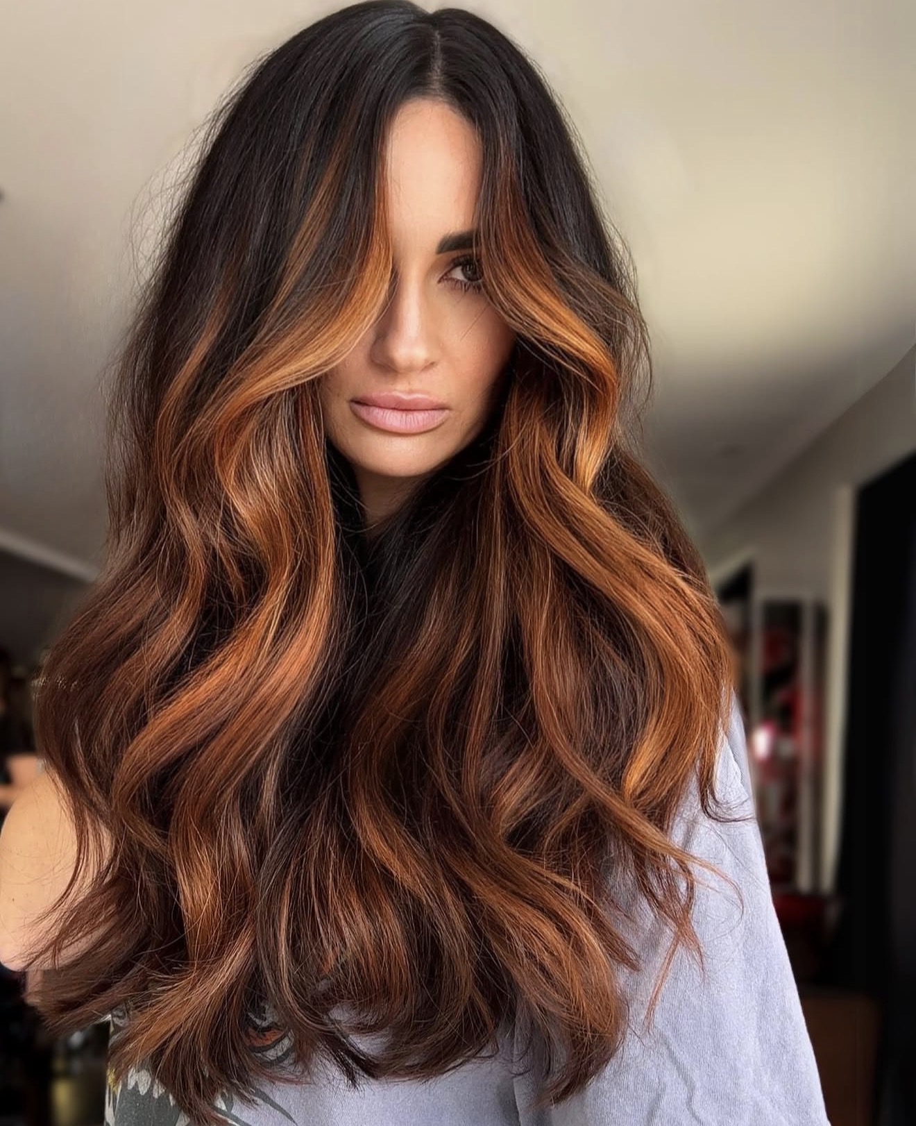 Warm Copper Balayage With Loose Waves