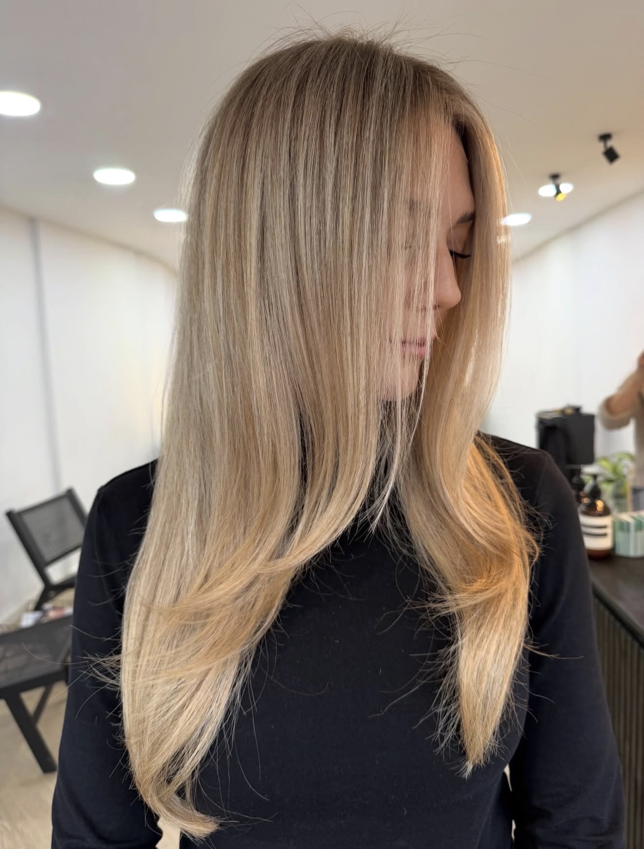 Warm Honey Blonde Layers With Soft Waves