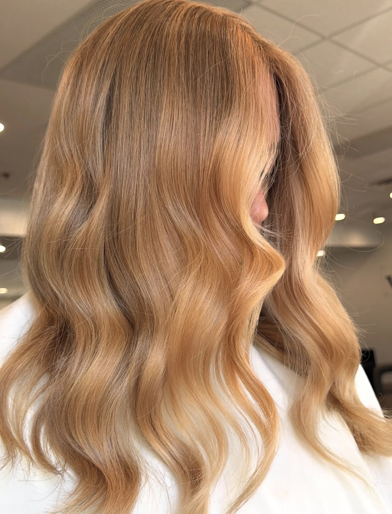 Warm Strawberry Blonde Waves With Subtle Dimension
